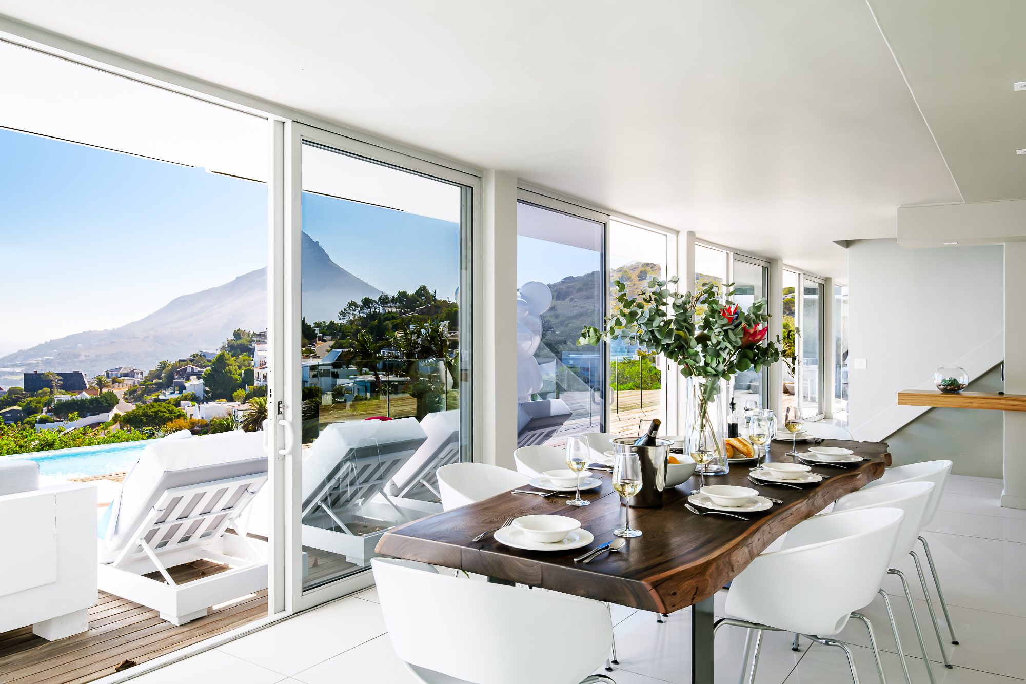 Living area with dining table and ocean view